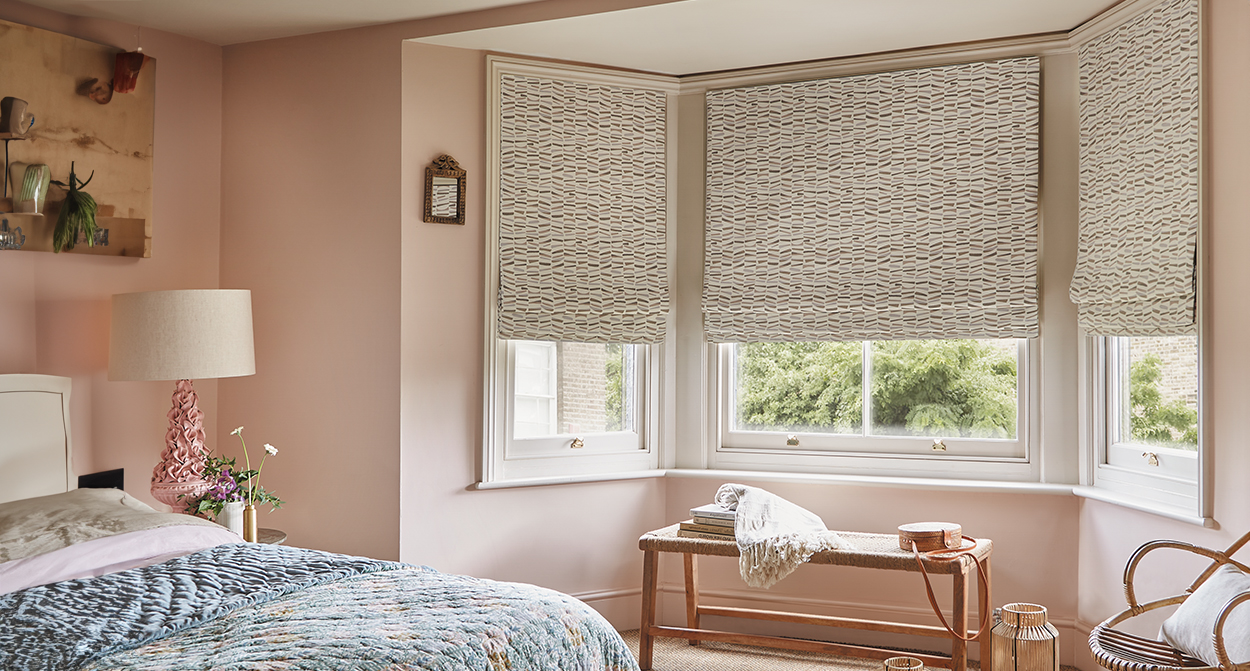 https://blinds4lesslondon.co.uk/wp-content/uploads/2025/11/patterned-roman-blinds-for-the-bedroom-blinds4less-london.jpg